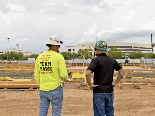 Guys guys looking at a commercial construction project